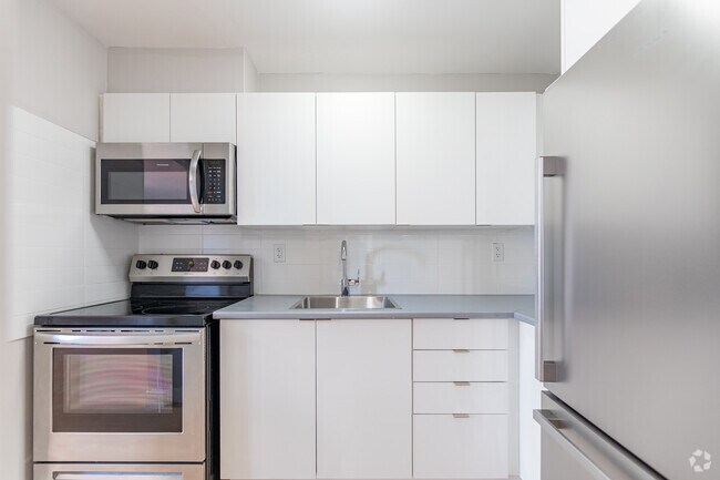 2 chambres, 1 salle de bain - 70 m² - Cuisine - Riverside Tower