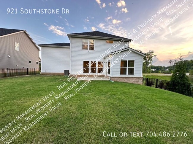 Building Photo - New home with many community amenities yet...