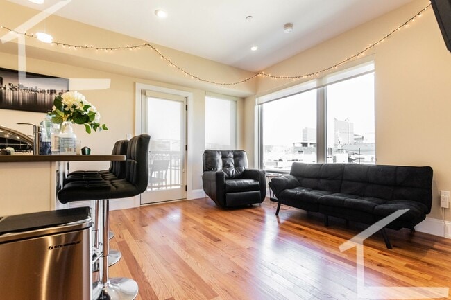 Photo - No Brokers Fee, Steps from Boston Lending, In-Unit Washer and Dryer, Central Heat/AC, Parking. Apartment