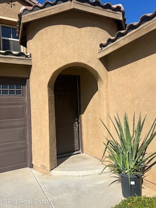 Foto del edificio - 4 br, 3 bath House - 9714 Oporto Way