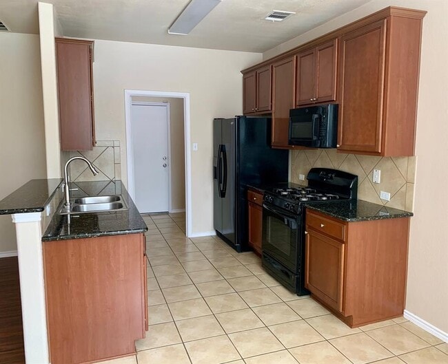 Foto del edificio - 1509 Huckleberry Ln