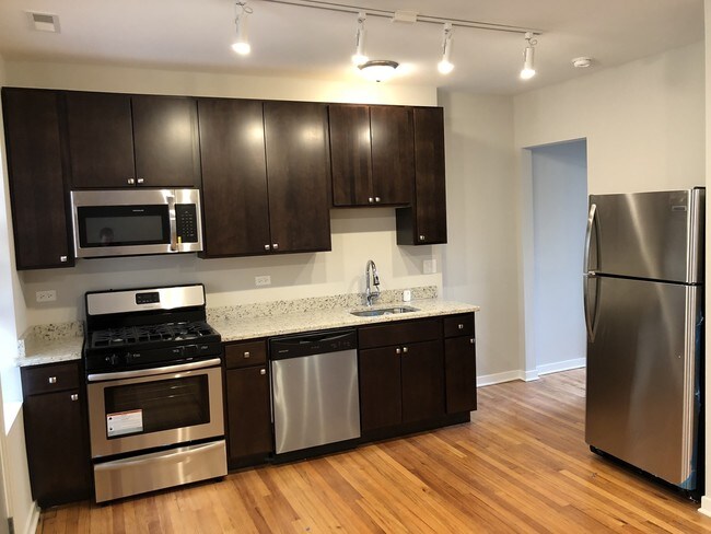 Foto del edificio - 4815 N Christiana Ave