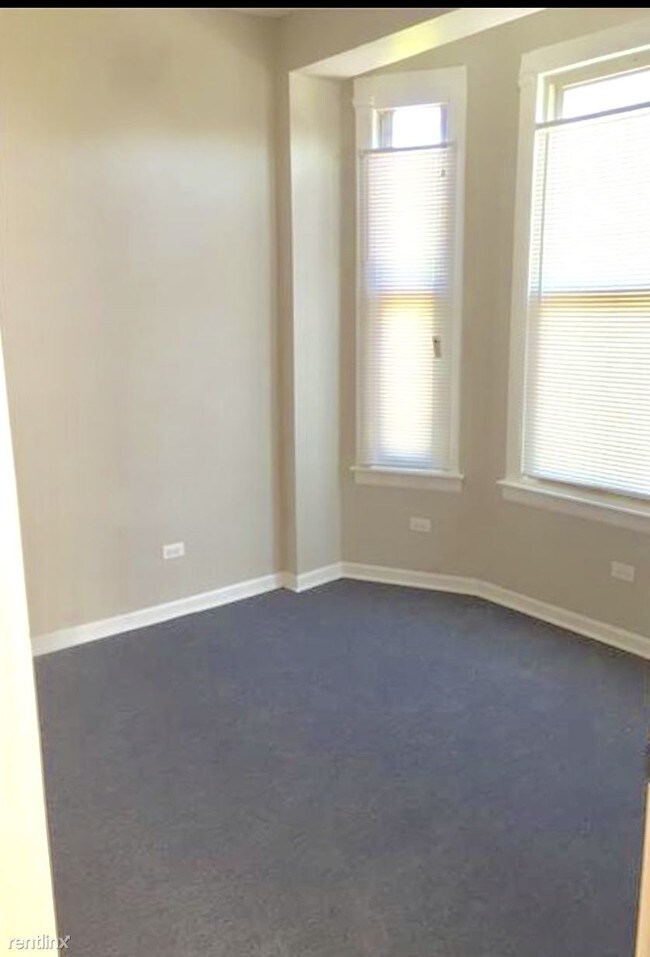 Building Photo - 4 br, 1 bath Apartment - 4400 W Jackson Blvd