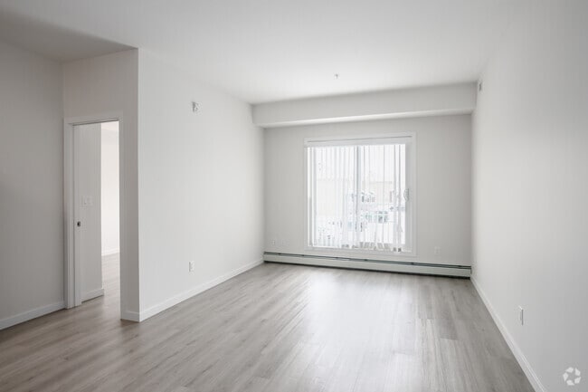 2BR, 2BA - 878SF - Living Room - BlueWater Apartments South