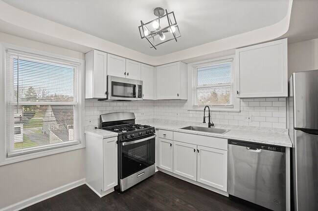 Building Photo - 13645 Cedar Road, Unit Up Unit