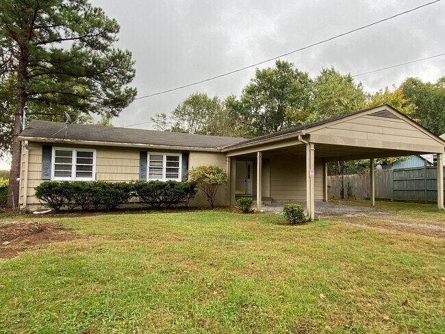 Building Photo - One Level Living with Private Backyard and...