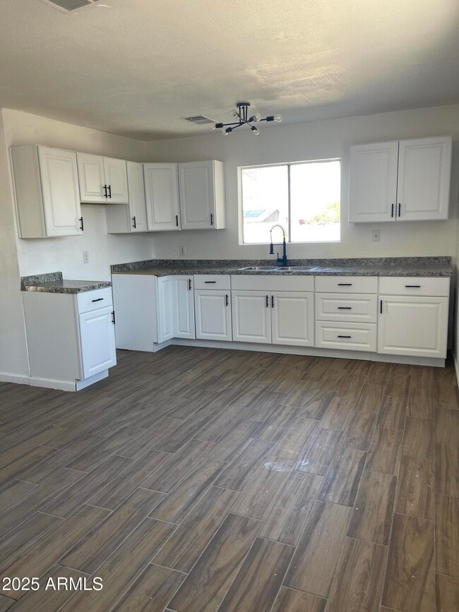 Building Photo - 1203 N Myers Blvd