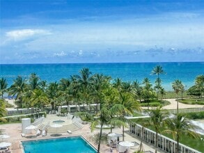 Building Photo - 10275 Collins Ave
