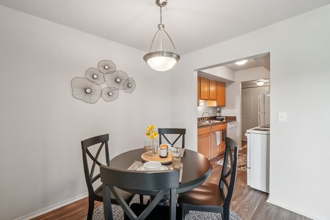 Spacious dining room area at Drawbridge Apartments in Harrison Township, MI. - Drawbridge Apartments East