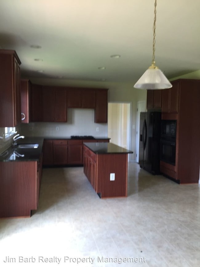 Building Photo - 4 br, 2.5 bath House - 2321 Stoneridge Rd.