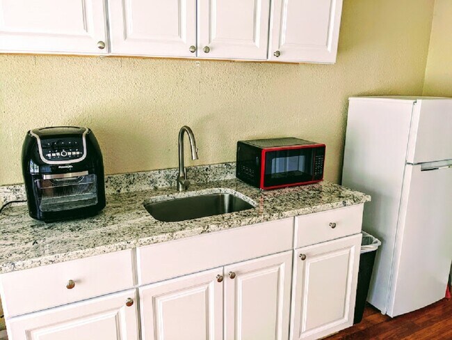 new granite topped kitchenet - 2255 1st Ave N