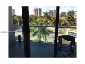 Building Photo - 19370 Collins Ave
