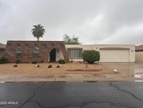 Building Photo - 9719 W Rolling Hills Dr