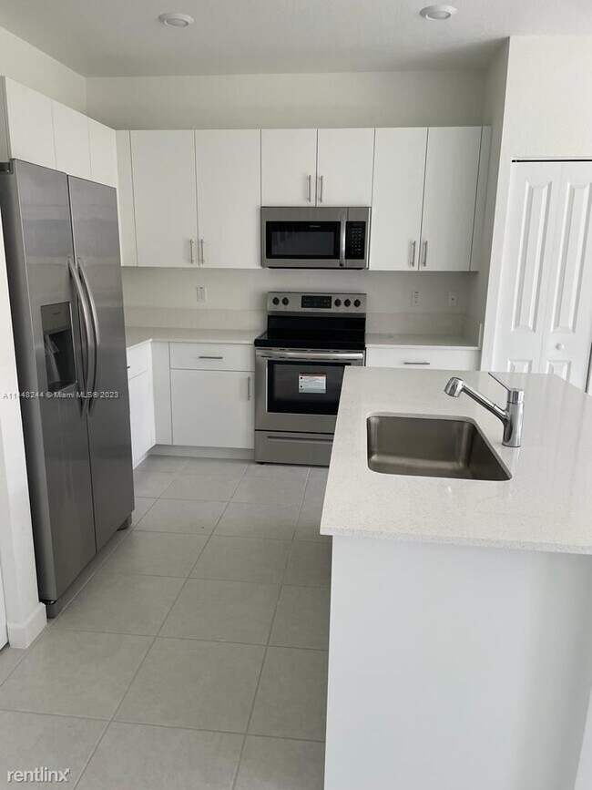 Building Photo - 3 br, 2.5 bath House - 11922 NW 47th Mnr #...