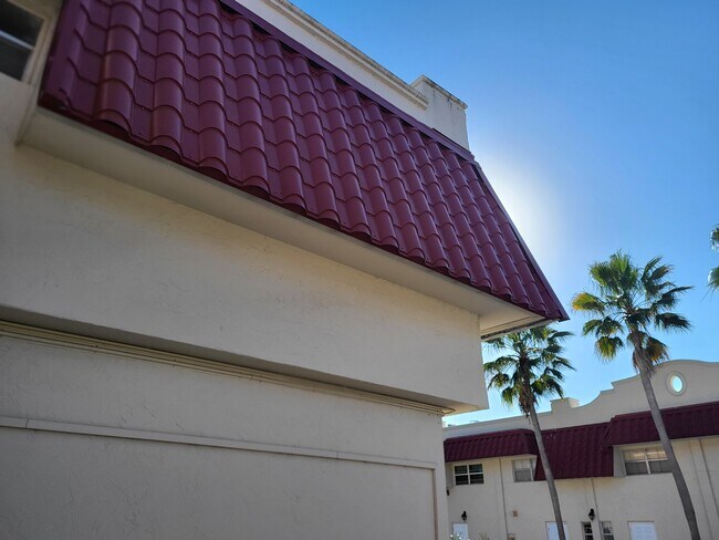 Hurricane mansards - 6711 N Kendall Dr