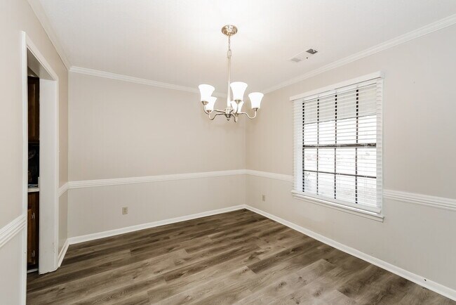 Building Photo - 7965 Meadow Trail Dr