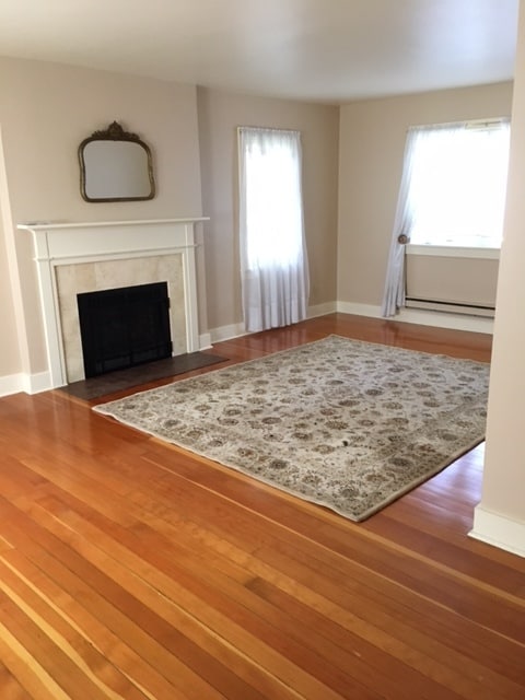 Living room with gas fireplace - 2901 S Lake Ave