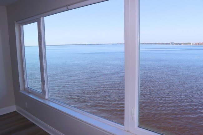 Building Photo - Luxurious Two-Story Condo with Breathtaking River Views ?