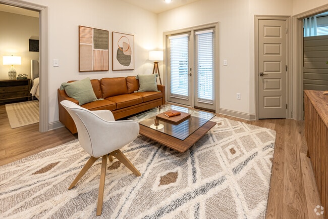 The Cedar: 2BR, 2BA -Living Room - The Waters at West Village