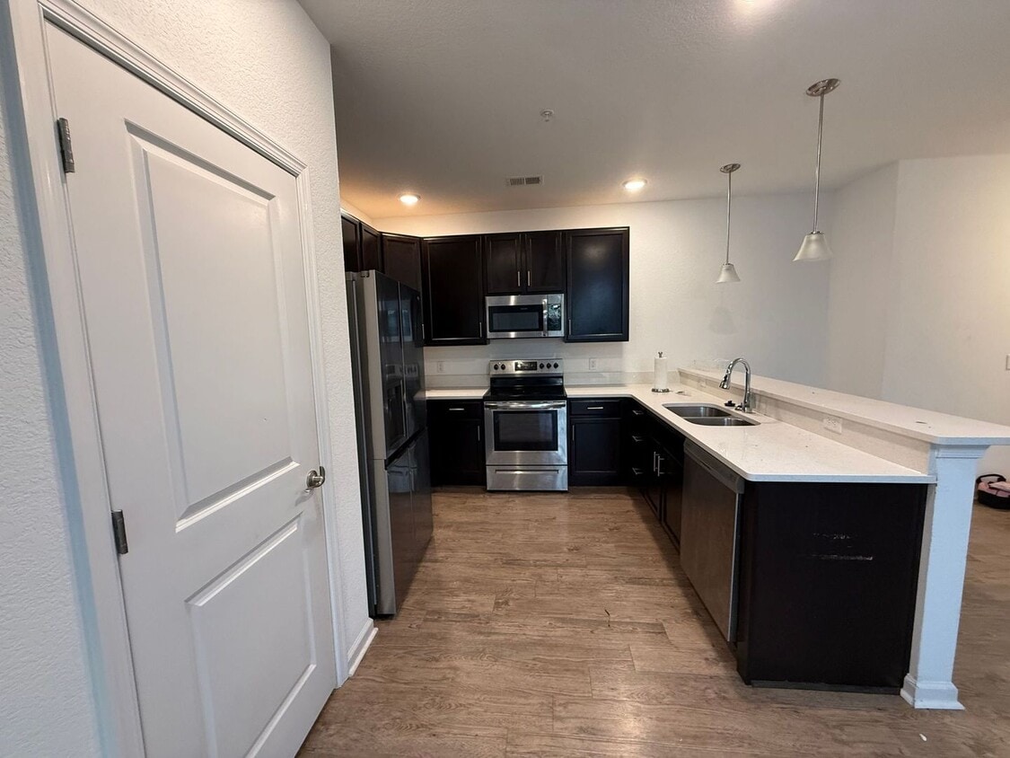 Building Photo - Newly Built 2BR Condo "ASK ABOUT OUR ZERO DEPOSIT"