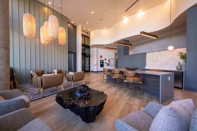 Vestíbulo y espacio comunitario de Joli - Joli