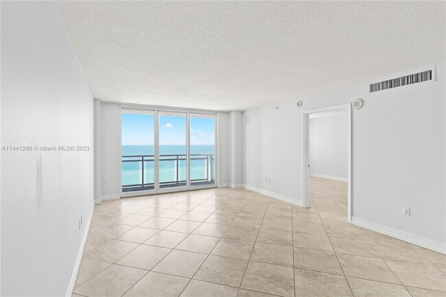 Building Photo - 6917 Collins Ave