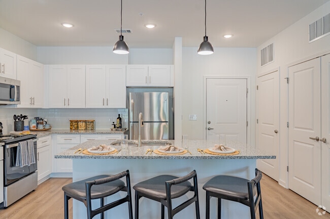 3BR, 2BA - 1,118SF - Kitchen - Raleigh Exchange