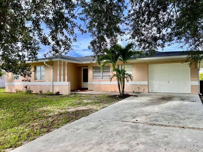 Building Photo - Live Comfortably in SE Cape Coral – Bright, Remodeled Home for Rent
