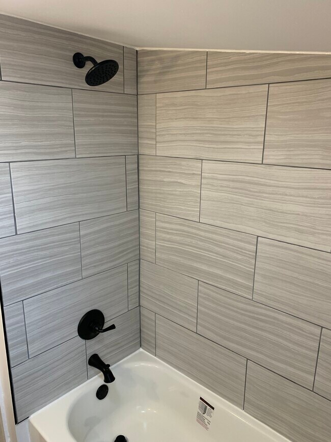 Newly tiled tub shower - 205 Green St