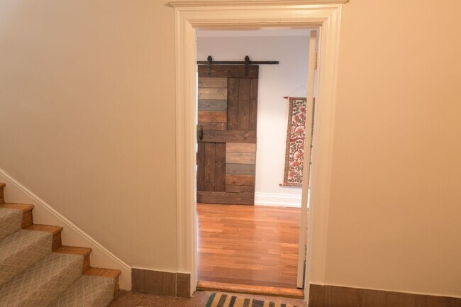 Building Photo - Charming 2BR + home office Condo in the he...