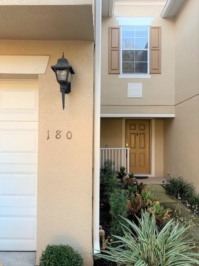 Building Photo - Gated 3/2.5 Townhouse with Garage in Altam...