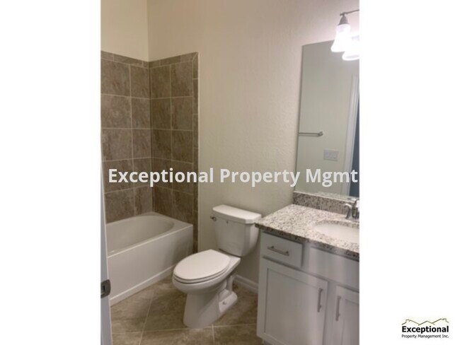 Building Photo - AVAILABLE IN JULY! Beautiful 4-bedroom 3 b...