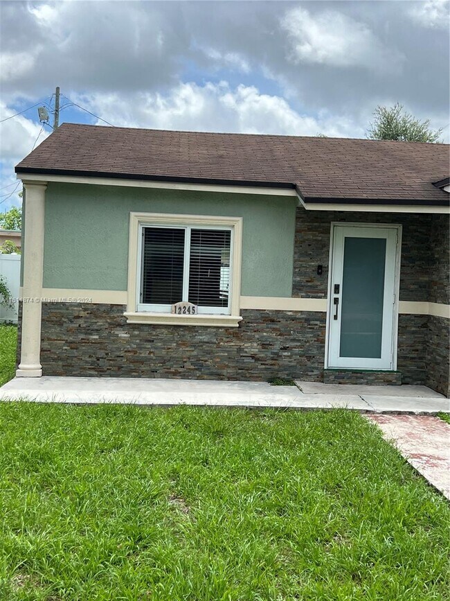 Building Photo - 12245 NW 10th Ave