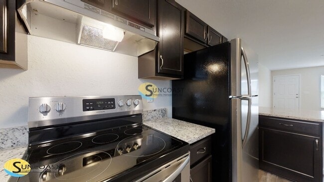 Building Photo - 9434 N Manashee Dr