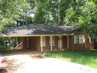 Exterior of property. - 1067 College Station Road