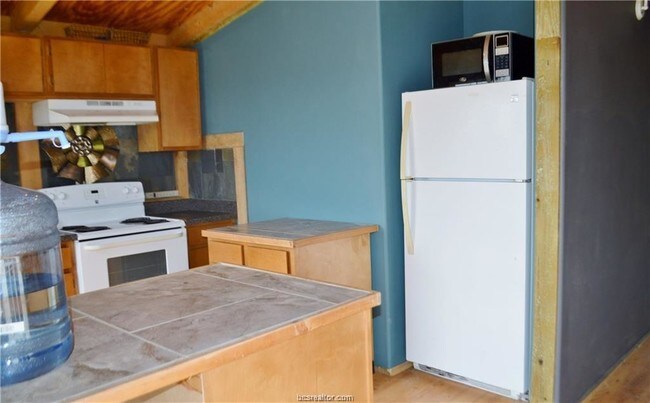 Foto del edificio - 13855 Farm Rd