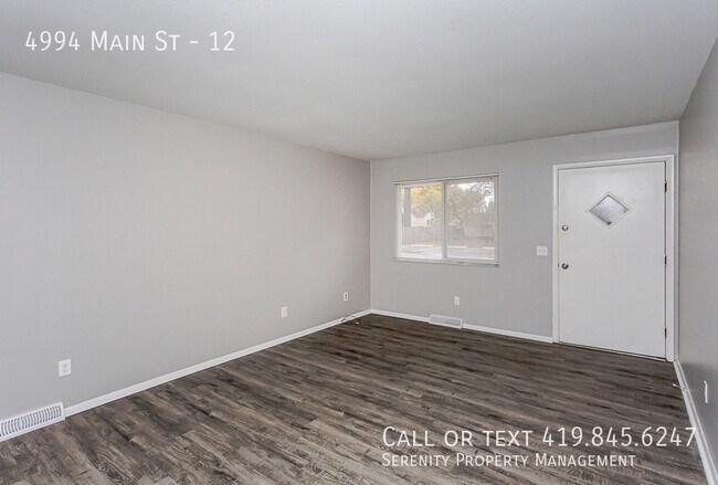 Foto del edificio - 4994 Main St