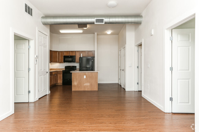 2BR, 2BA - 985SF Living Room & Kitchen - East Meadows Apartments