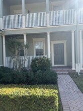Building Photo - 211 E Thatch Palm Cir