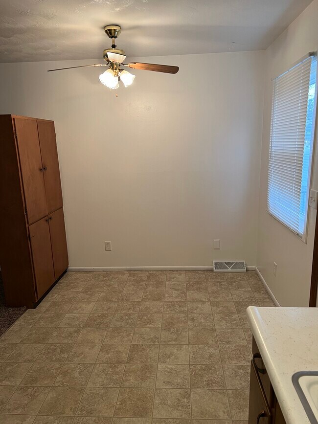 Eating Area in Kitchen w/ Pantry - 102 W Spring St