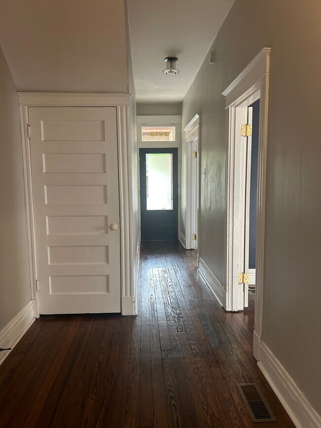 Long hallway with under stair storage - 2819 Accomac St