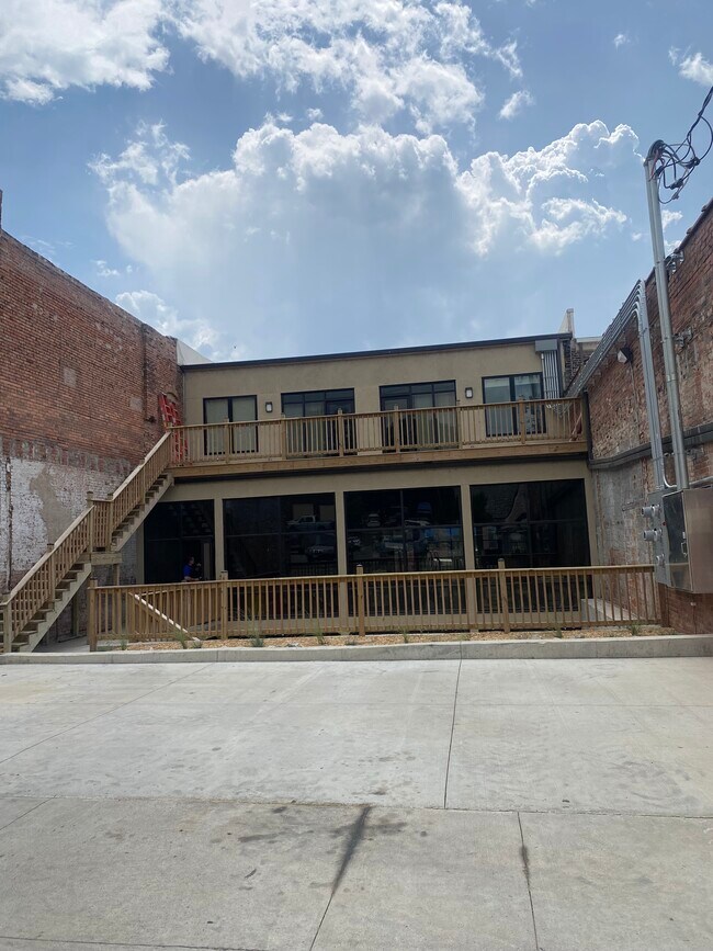 Rear entrance with off-street parking (Direct Entrance) - 307 E Main St