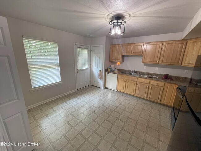 Foto del edificio - 5911 Woodcreek Crossing Way