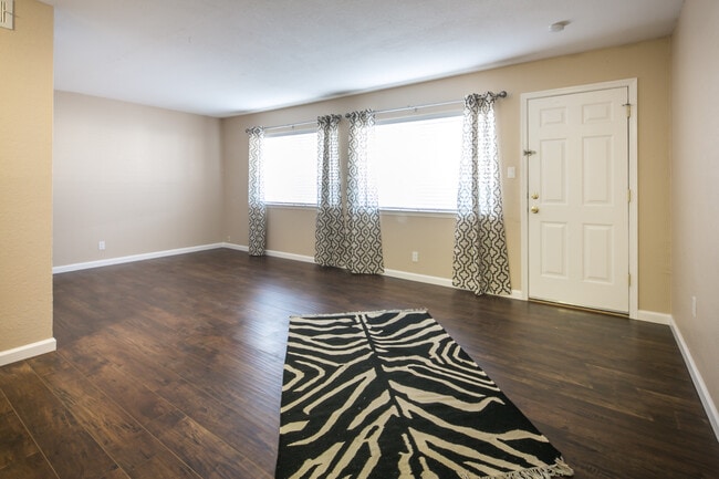 Building Photo - Absolutely darling, fully remodeled, single story, updated condo in a NE Heights gated community!