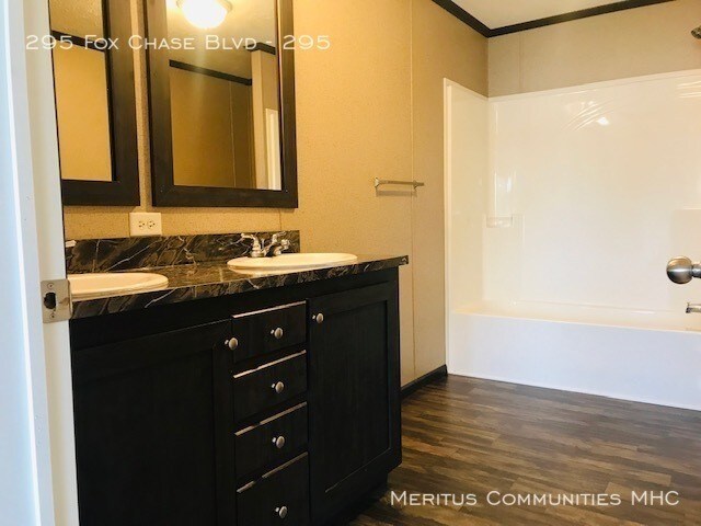 Building Photo - RENT WITH STYLE AND AT A GREAT PRICE