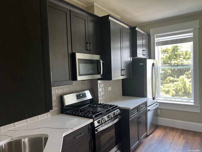 Building Photo - 59-24 Summerfield St