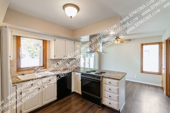 Building Photo - FINISHED BASEMENT WITH FENCED YARD-LEASE E...