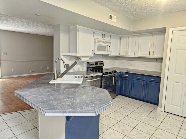 Foto del edificio - 8184 McGuire Dr