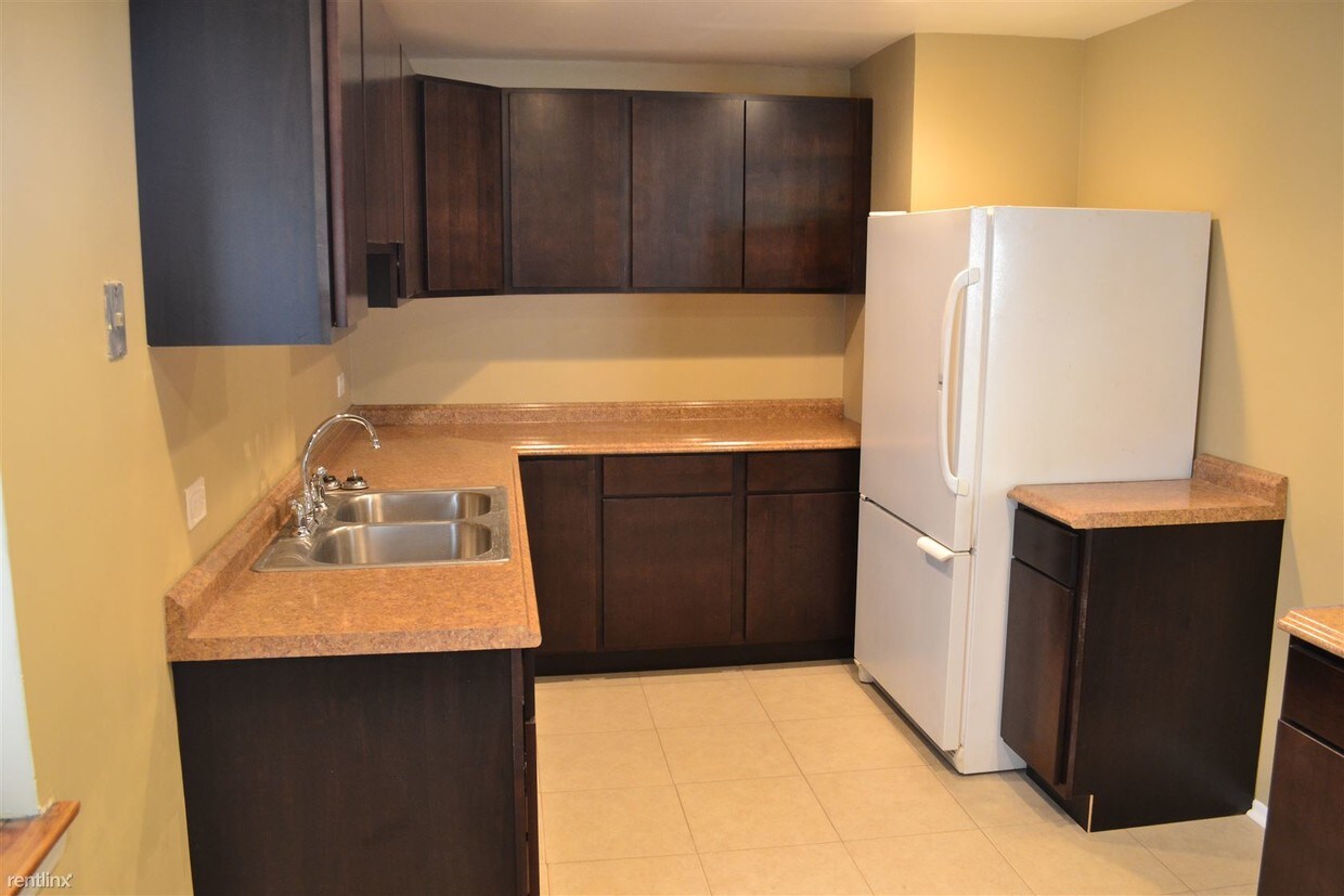 Foto principal - 2 br, 1 bath Apartment - 8218 S Vernon Ave