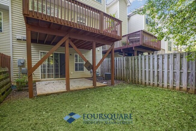 Building Photo - Lakefront Townhome with 1st Floor Bedroom, Fireplace & 2-Car Garage – In Raleigh
